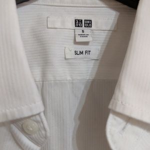 White Slim Fit Uniqlo Long sleeved shirt.